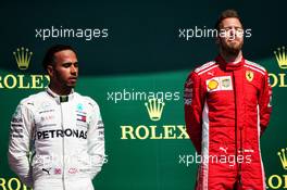 The podium (L to R): Lewis Hamilton (GBR) Mercedes AMG F1 with race winner Sebastian Vettel (GER) Ferrari. 08.07.2018. Formula 1 World Championship, Rd 10, British Grand Prix, Silverstone, England, Race Day.