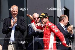 Race winner Sebastian Vettel (GER) Ferrari celebrates on the podium. 08.07.2018. Formula 1 World Championship, Rd 10, British Grand Prix, Silverstone, England, Race Day.
