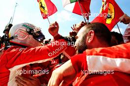 Race winner Sebastian Vettel (GER) Ferrari celebrates with the team in parc ferme. 08.07.2018. Formula 1 World Championship, Rd 10, British Grand Prix, Silverstone, England, Race Day.