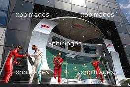 Lewis Hamilton (GBR) Mercedes AMG F1 , Sebastian Vettel (GER) Scuderia Ferrari and Kimi Raikkonen (FIN) Scuderia Ferrari  08.07.2018. Formula 1 World Championship, Rd 10, British Grand Prix, Silverstone, England, Race Day.