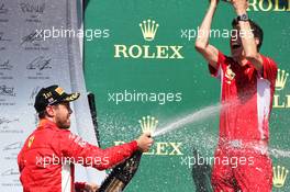 Race winner Sebastian Vettel (GER) Ferrari celebrates on the podium with Claudio Albertini (ITA) Ferrari. 08.07.2018. Formula 1 World Championship, Rd 10, British Grand Prix, Silverstone, England, Race Day.