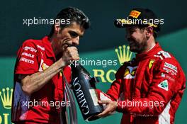 (L to R): Claudio Albertini (ITA) Ferrari celebrates on the podium with race winner Sebastian Vettel (GER) Ferrari. 08.07.2018. Formula 1 World Championship, Rd 10, British Grand Prix, Silverstone, England, Race Day.