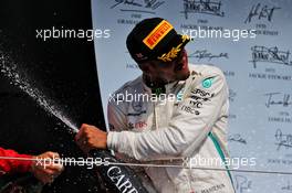 Lewis Hamilton (GBR) Mercedes AMG F1 celebrates his second position on the podium. 08.07.2018. Formula 1 World Championship, Rd 10, British Grand Prix, Silverstone, England, Race Day.