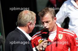 Kimi Raikkonen (FIN) Ferrari with Martin Brundle (GBR) Sky Sports Commentator in parc ferme. 08.07.2018. Formula 1 World Championship, Rd 10, British Grand Prix, Silverstone, England, Race Day.