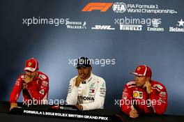 The post qualifying FIA Press Conference (L to R): Sebastian Vettel (GER) Ferrari, second; Lewis Hamilton (GBR) Mercedes AMG F1, pole position; Kimi Raikkonen (FIN) Ferrari, third. 07.07.2018. Formula 1 World Championship, Rd 10, British Grand Prix, Silverstone, England, Qualifying Day.