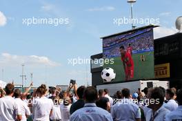The England vs Sweden World Cup Quarter Final is shown on a big screen at the Heineken Bar in the paddock. 07.07.2018. Formula 1 World Championship, Rd 10, British Grand Prix, Silverstone, England, Qualifying Day.