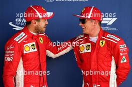(L to R): Sebastian Vettel (GER) Ferrari with team mate Kimi Raikkonen (FIN) Ferrari in qualifying parc ferme. 07.07.2018. Formula 1 World Championship, Rd 10, British Grand Prix, Silverstone, England, Qualifying Day.