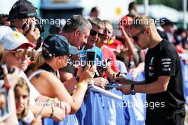 Valtteri Bottas (FIN) Mercedes AMG F1 signs autographs for the fans. 07.07.2018. Formula 1 World Championship, Rd 10, British Grand Prix, Silverstone, England, Qualifying Day.