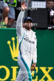 Lewis Hamilton (GBR) Mercedes AMG F1 W09 celebrates his pole position in qualifying parc ferme. 07.07.2018. Formula 1 World Championship, Rd 10, British Grand Prix, Silverstone, England, Qualifying Day.