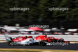 Kimi Raikkonen (FIN) Ferrari SF71H leads Charles Leclerc (MON) Sauber F1 Team C37. 07.07.2018. Formula 1 World Championship, Rd 10, British Grand Prix, Silverstone, England, Qualifying Day.
