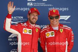 Sebastian Vettel (GER) Ferrari SF71H and Kimi Raikkonen (FIN) Ferrari SF71H. 07.07.2018. Formula 1 World Championship, Rd 10, British Grand Prix, Silverstone, England, Qualifying Day.
