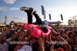 Johnny Herbert (GBR) Sky Sports F1 Presenter crowd surfs at the Sahara Force India F1 Team Fan Zone. 07.07.2018. Formula 1 World Championship, Rd 10, British Grand Prix, Silverstone, England, Qualifying Day.