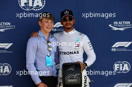 (L to R): Billy Monger (GBR) Racing Driver presents the Pirelli Pole Position award to Lewis Hamilton (GBR) Mercedes AMG F1. 07.07.2018. Formula 1 World Championship, Rd 10, British Grand Prix, Silverstone, England, Qualifying Day.