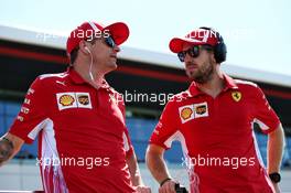 (L to R): Kimi Raikkonen (FIN) Ferrari with Sebastian Vettel (GER) Ferrari on the drivers parade. 08.07.2018. Formula 1 World Championship, Rd 10, British Grand Prix, Silverstone, England, Race Day.