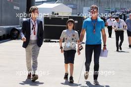 David Coulthard (GBR) Red Bull Racing and Scuderia Toro Advisor / Channel 4 F1 Commentator with his son Dayton Coulthard and Dillon Stewart (GBR) (Left). 05.07.2018. Formula 1 World Championship, Rd 10, British Grand Prix, Silverstone, England, Preparation Day.