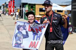 Daniel Ricciardo (AUS) Red Bull Racing with a young fan. 05.07.2018. Formula 1 World Championship, Rd 10, British Grand Prix, Silverstone, England, Preparation Day.