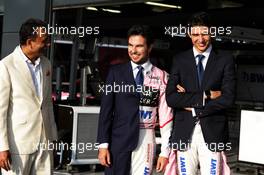 (L to R): Arshad Mahmood, Apsley Taylors CEO with Sergio Perez (MEX) Sahara Force India F1 and Esteban Ocon (FRA) Sahara Force India F1 Team. 05.07.2018. Formula 1 World Championship, Rd 10, British Grand Prix, Silverstone, England, Preparation Day.
