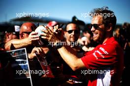 Sebastian Vettel (GER) Ferrari signs autographs for the fans. 05.07.2018. Formula 1 World Championship, Rd 10, British Grand Prix, Silverstone, England, Preparation Day.