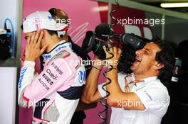 (L to R): Esteban Ocon (FRA) Sahara Force India F1 Team and Jean Michel Tibi (FRA) Cameraman. 20.07.2018. Formula 1 World Championship, Rd 11, German Grand Prix, Hockenheim, Germany, Practice Day.
