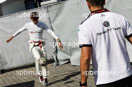 Charles Leclerc (MON) Sauber F1 Team plays football. 20.07.2018. Formula 1 World Championship, Rd 11, German Grand Prix, Hockenheim, Germany, Practice Day.