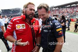 (L to R): Gino Rosato (CDN) Ferrari with Christian Horner (GBR) Red Bull Racing Team Principal on the grid. 22.07.2018. Formula 1 World Championship, Rd 11, German Grand Prix, Hockenheim, Germany, Race Day.