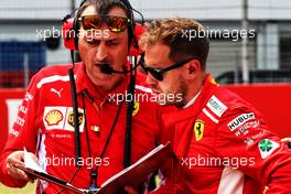 Sebastian Vettel (GER) Ferrari with Riccardo Adami (ITA) Ferrari Race Engineer on the grid. 22.07.2018. Formula 1 World Championship, Rd 11, German Grand Prix, Hockenheim, Germany, Race Day.
