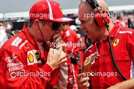 (L to R): Kimi Raikkonen (FIN) Ferrari with Mark Arnall (GBR) Personal Trainer on the grid. 22.07.2018. Formula 1 World Championship, Rd 11, German Grand Prix, Hockenheim, Germany, Race Day.