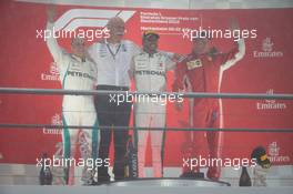 The podium (L to R): Valtteri Bottas (FIN) Mercedes AMG F1, second; Dr. Dieter Zetsche (GER) Daimler AG CEO; Lewis Hamilton (GBR) Mercedes AMG F1, race winner; Kimi Raikkonen (FIN) Ferrari, third. 22.07.2018. Formula 1 World Championship, Rd 11, German Grand Prix, Hockenheim, Germany, Race Day.