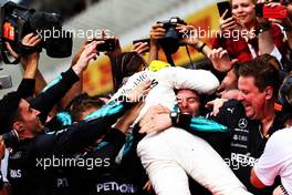 Race winner Lewis Hamilton (GBR) Mercedes AMG F1 celebrates with the team at the end of the race. 22.07.2018. Formula 1 World Championship, Rd 11, German Grand Prix, Hockenheim, Germany, Race Day.
