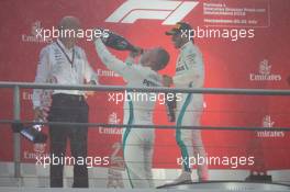 (L to R): Dr. Dieter Zetsche (GER) Daimler AG CEO celebrates on the podium with second placed Valtteri Bottas (FIN) Mercedes AMG F1 and rwe Lewis Hamilton (GBR) Mercedes AMG F1. 22.07.2018. Formula 1 World Championship, Rd 11, German Grand Prix, Hockenheim, Germany, Race Day.
