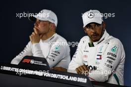 Lewis Hamilton (GBR) Mercedes AMG F1 and Valtteri Bottas (FIN) Mercedes AMG F1 in the FIA Press Conference. 22.07.2018. Formula 1 World Championship, Rd 11, German Grand Prix, Hockenheim, Germany, Race Day.