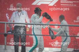 Race winner Lewis Hamilton (GBR) Mercedes AMG F1 celebrates on the podium with Dr. Dieter Zetsche (GER) Daimler AG CEO and Valtteri Bottas (FIN) Mercedes AMG F1. 22.07.2018. Formula 1 World Championship, Rd 11, German Grand Prix, Hockenheim, Germany, Race Day.
