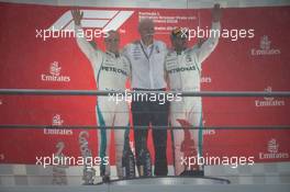 (L to R): Valtteri Bottas (FIN) Mercedes AMG F1 celebrates his second position on the podium with Dr. Dieter Zetsche (GER) Daimler AG CEO and race winner Lewis Hamilton (GBR) Mercedes AMG F1. 22.07.2018. Formula 1 World Championship, Rd 11, German Grand Prix, Hockenheim, Germany, Race Day.