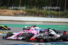 Esteban Ocon (FRA) Sahara Force India F1 VJM11 and Romain Grosjean (FRA) Haas F1 Team VF-18 battle for position. 22.07.2018. Formula 1 World Championship, Rd 11, German Grand Prix, Hockenheim, Germany, Race Day.