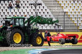 The Ferrari SF71H of Sebastian Vettel (GER) Ferrari is removed from the circuit after he crashed out of the race. 22.07.2018. Formula 1 World Championship, Rd 11, German Grand Prix, Hockenheim, Germany, Race Day.