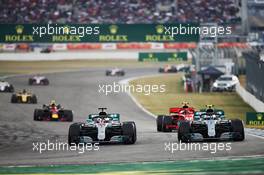 Lewis Hamilton (GBR) Mercedes AMG F1 W09 battle for the lead of the race with team mate Valtteri Bottas (FIN) Mercedes AMG F1 W09. 22.07.2018. Formula 1 World Championship, Rd 11, German Grand Prix, Hockenheim, Germany, Race Day.