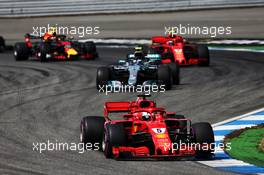 Sebastian Vettel (GER) Ferrari SF71H leads at the start of the race. 22.07.2018. Formula 1 World Championship, Rd 11, German Grand Prix, Hockenheim, Germany, Race Day.