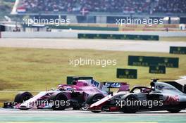 Sergio Perez (MEX) Sahara Force India F1 VJM11 and Romain Grosjean (FRA) Haas F1 Team VF-18 battle for position. 22.07.2018. Formula 1 World Championship, Rd 11, German Grand Prix, Hockenheim, Germany, Race Day.