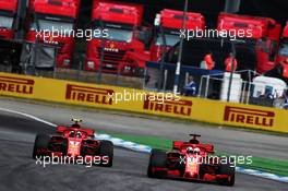 Sebastian Vettel (GER) Ferrari SF71H passes team mate Kimi Raikkonen (FIN) Ferrari SF71H. 22.07.2018. Formula 1 World Championship, Rd 11, German Grand Prix, Hockenheim, Germany, Race Day.