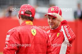 (L to R): Kimi Raikkonen (FIN) Ferrari with pole sitter and team mate Sebastian Vettel (GER) Ferrari in qualifying parc ferme. 21.07.2018. Formula 1 World Championship, Rd 11, German Grand Prix, Hockenheim, Germany, Qualifying Day.