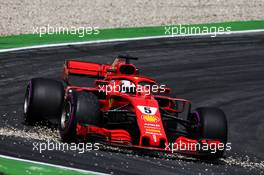 Sebastian Vettel (GER) Ferrari SF71H runs over gravel. 21.07.2018. Formula 1 World Championship, Rd 11, German Grand Prix, Hockenheim, Germany, Qualifying Day.