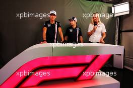 (L to R): Esteban Ocon (FRA) Sahara Force India F1 Team with Sergio Perez (MEX) Sahara Force India F1 and Rosanna Tennant (GBR) F1 Presenter in the F1 FanZone. 19.07.2018. Formula 1 World Championship, Rd 11, German Grand Prix, Hockenheim, Germany, Preparation Day.