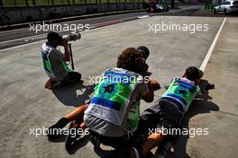 Photographers at the pit lane exit. 20.07.2018. Formula 1 World Championship, Rd 11, German Grand Prix, Hockenheim, Germany, Practice Day.