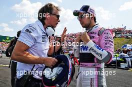 Sergio Perez (MEX) Sahara Force India F1 with Xavi Martos (ESP) Sahara Force India F1 Team Physio on the grid. 29.07.2018. Formula 1 World Championship, Rd 12, Hungarian Grand Prix, Budapest, Hungary, Race Day.