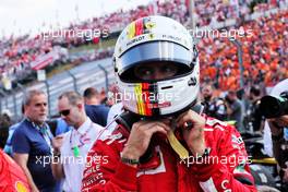 Sebastian Vettel (GER) Ferrari on the grid. 29.07.2018. Formula 1 World Championship, Rd 12, Hungarian Grand Prix, Budapest, Hungary, Race Day.