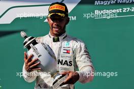 Race winner Lewis Hamilton (GBR) Mercedes AMG F1 celebrates on the podium. 29.07.2018. Formula 1 World Championship, Rd 12, Hungarian Grand Prix, Budapest, Hungary, Race Day.