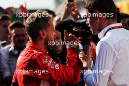 Sebastian Vettel (GER) Ferrari with Paul di Resta (GBR) Sky Sports F1 Presenter in parc ferme. 29.07.2018. Formula 1 World Championship, Rd 12, Hungarian Grand Prix, Budapest, Hungary, Race Day.
