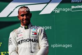 Race winner Lewis Hamilton (GBR) Mercedes AMG F1 on the podium. 29.07.2018. Formula 1 World Championship, Rd 12, Hungarian Grand Prix, Budapest, Hungary, Race Day.