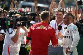 Lewis Hamilton (GBR) Mercedes AMG F1  and Sebastian Vettel (GER) Scuderia Ferrari with Paul Di Resta 29.07.2018. Formula 1 World Championship, Rd 12, Hungarian Grand Prix, Budapest, Hungary, Race Day.