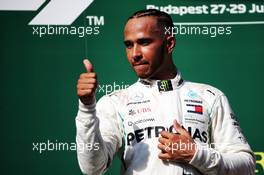 Race winner Lewis Hamilton (GBR) Mercedes AMG F1 celebrates on the podium. 29.07.2018. Formula 1 World Championship, Rd 12, Hungarian Grand Prix, Budapest, Hungary, Race Day.